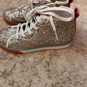 Kids high tops. Never worn.